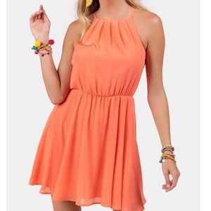 Francesca’s flawless dress in coral